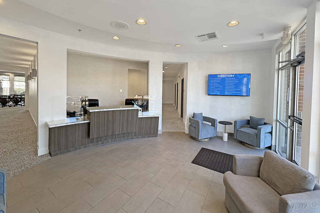 Reception and lounge area inside the Summit 23 Realty Henderson office